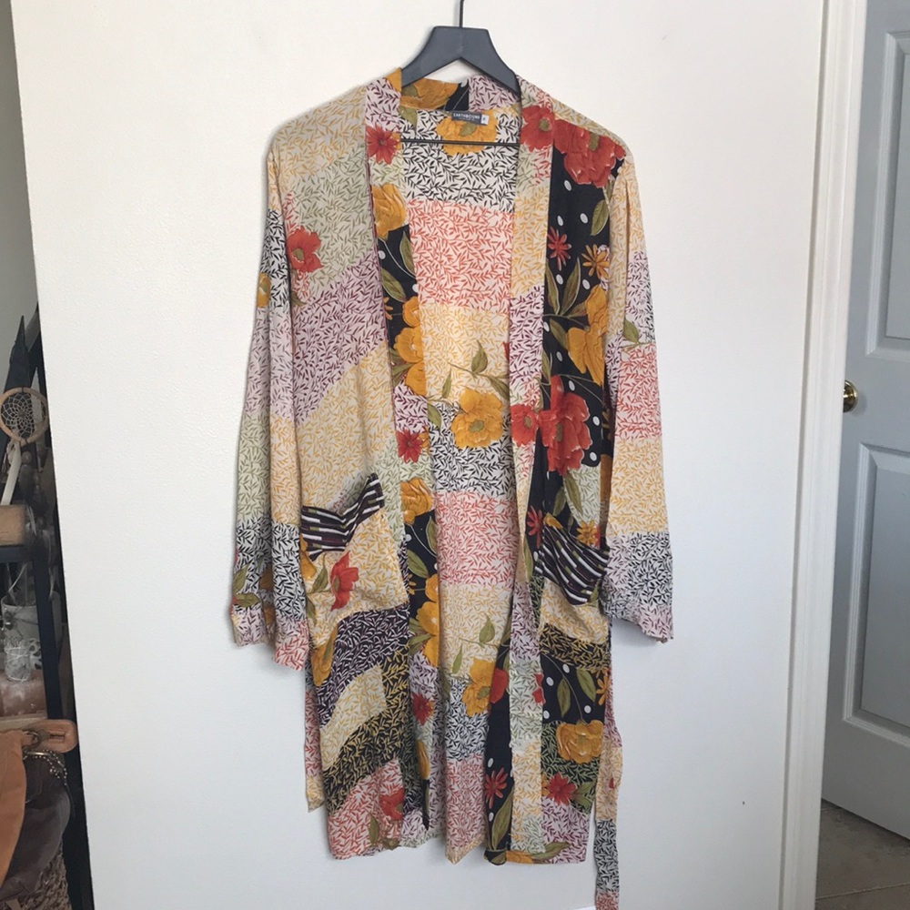 100% silk robe. Can be used inside or styled like a kimono.